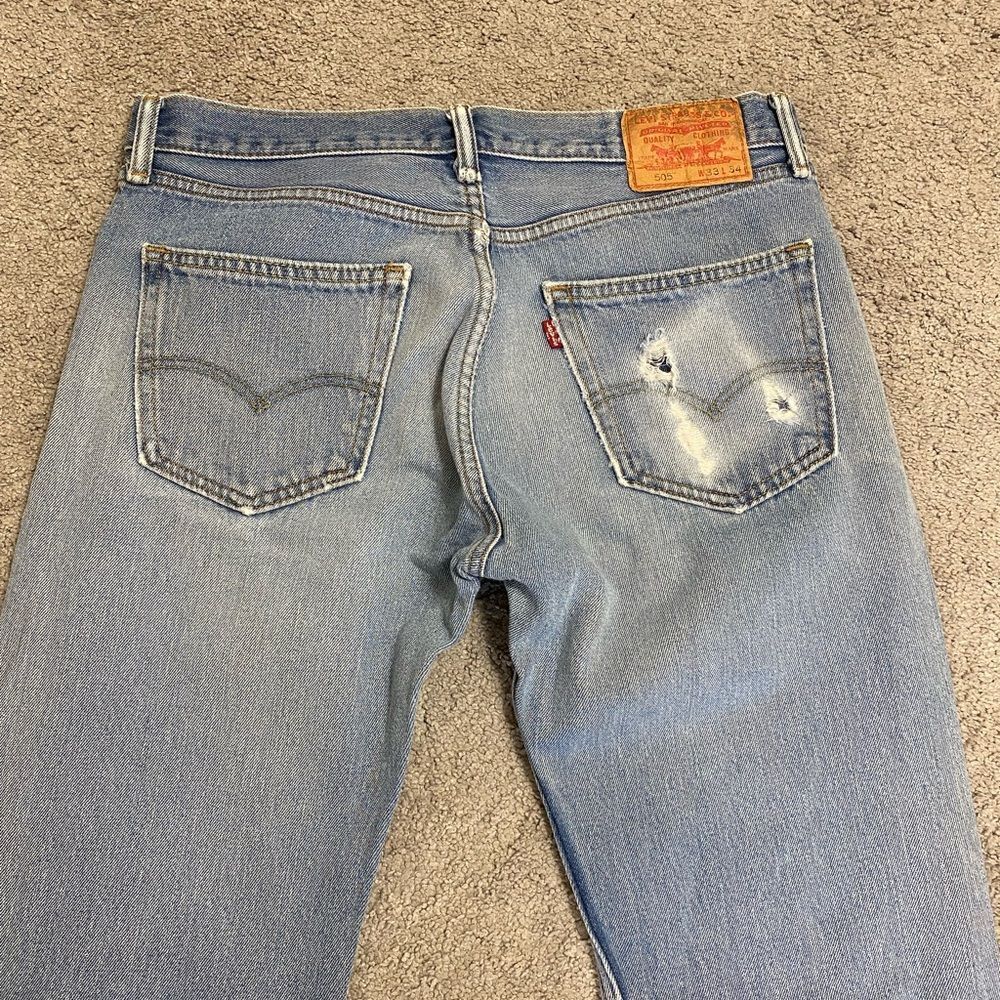 Levi's 505 Light Blue Straight Leg Jeans with Distressed Details - Picture 5 of 10